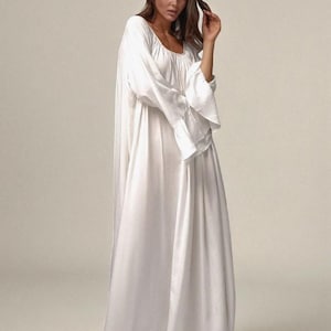 Long Flowing Maxi Dress with Flared Sleeves and Gathered Neckline